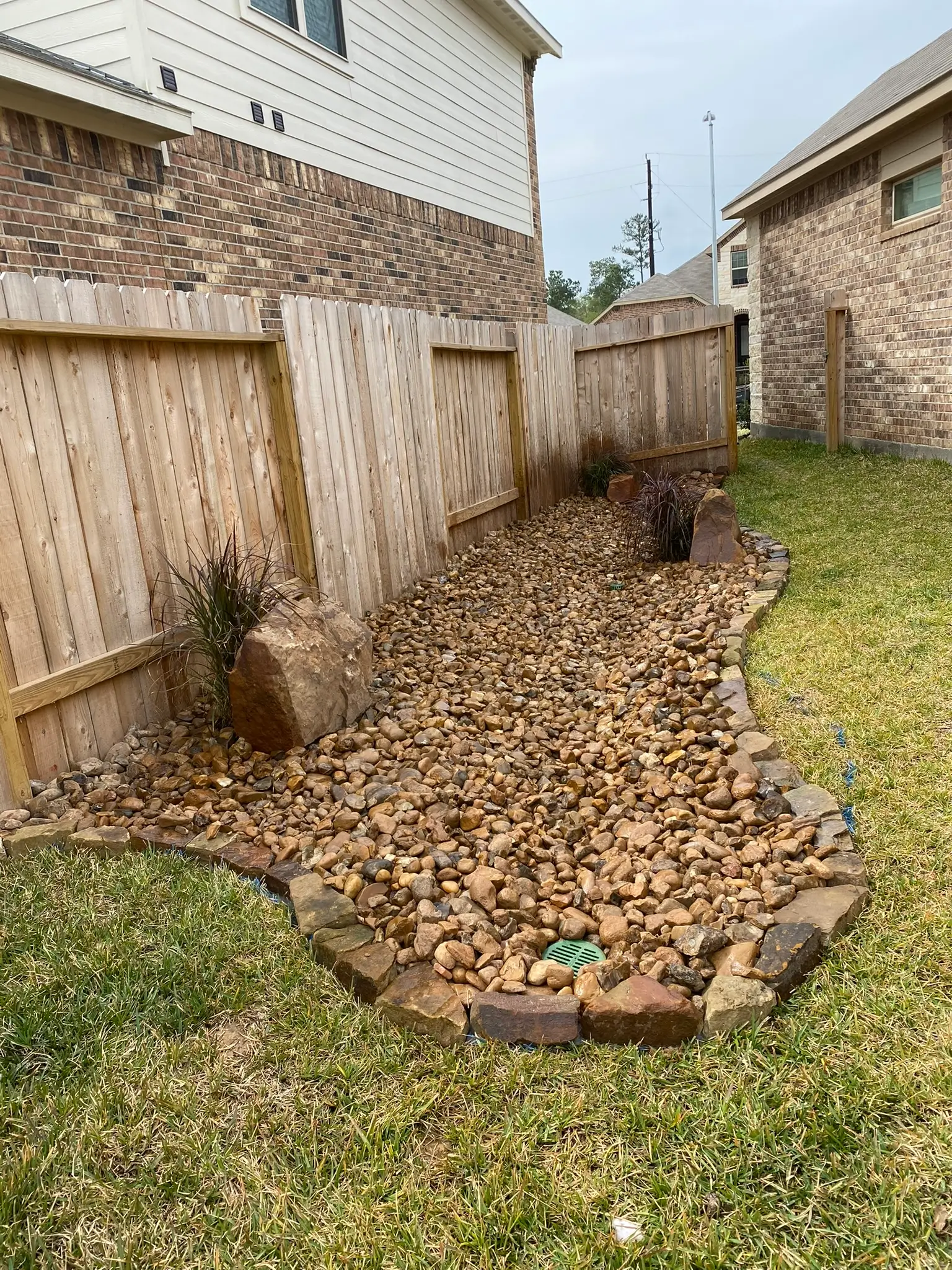 Artificial turf installation in The Woodlands TX by FM Landscaping and Hardscape